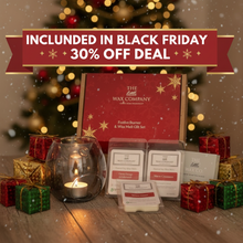 Wax product set from The Wax Company with Christmas tree and decorations in the background