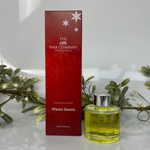The Little Wax Company winter season diffuser packaging and bottle with mistletoe on a white background