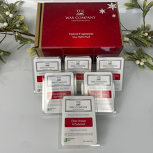 The Wax Company festive fragrances wax melt set with a red box on a white background.