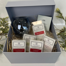 Gift set with candles and diffuser from The Wax Company in a box.